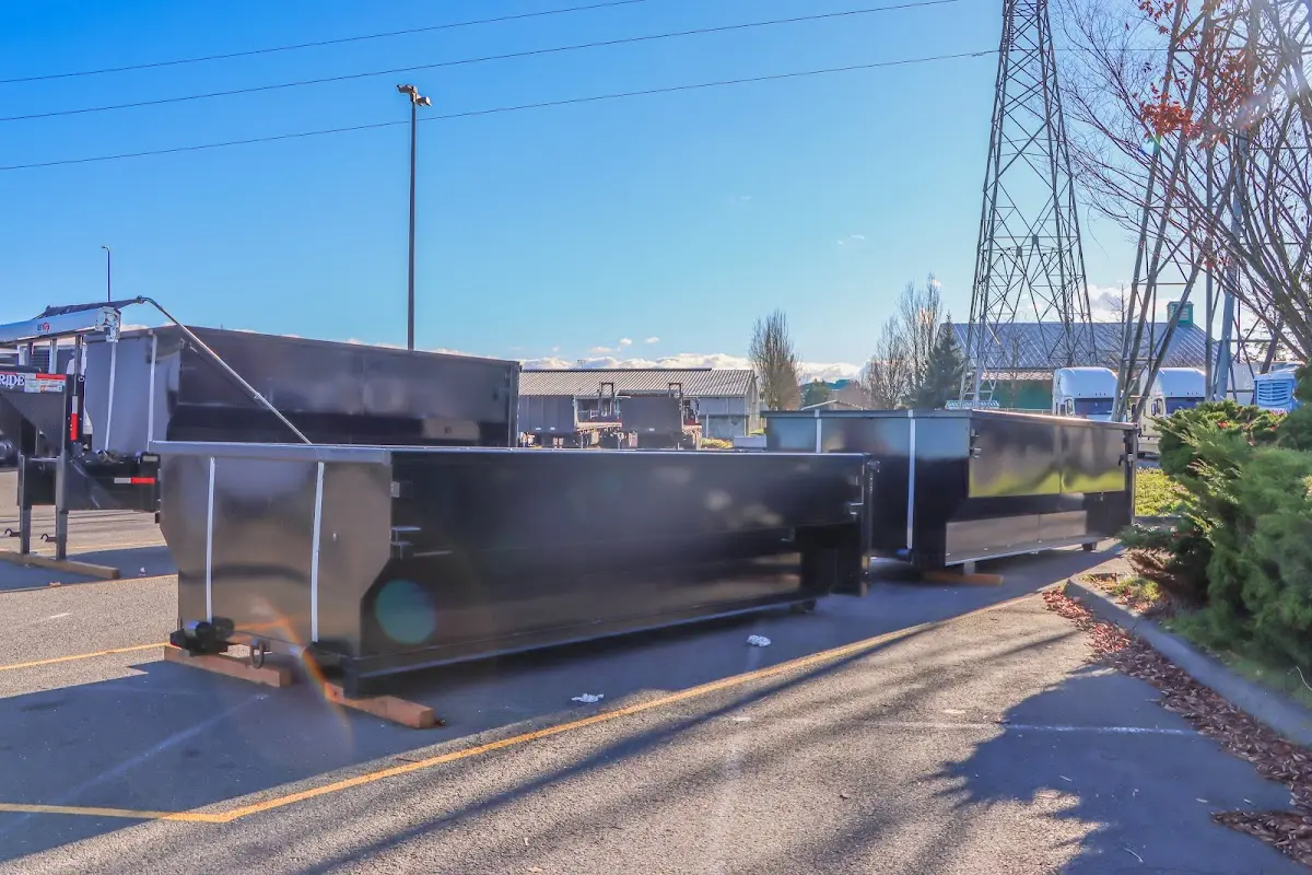 Roll-off dumpster ready for waste disposal at job site for Yard Waste Dumpster Rental in University of Virginia
